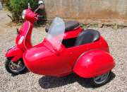 Vespa piaggio lx with sidecar red